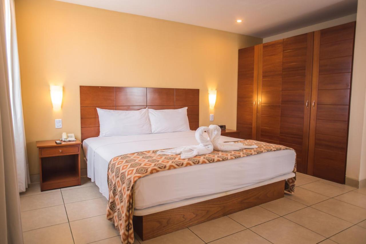 Wyndham Costa Del Sol Pucallpa Exteriér fotografie A bedroom at the hotel